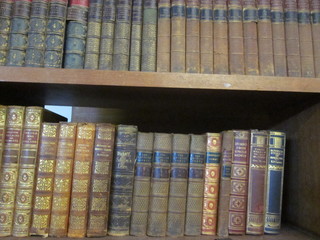 A collection of various leather bound books