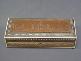 A rectangular carved hardwood Eastern box with hinged lid, decorated The Taj Mahal 11"