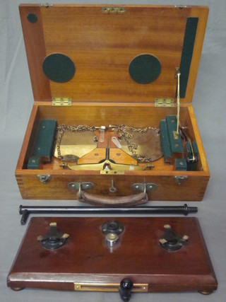 A pair of Avery portable folding scales contained in a mahogany  case