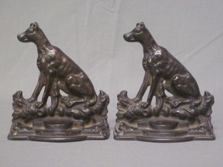 A pair of 19th Century iron bookends in the form of seated dogs  - A Sportsman's Friend, 7"
