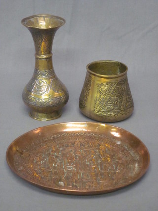 A circular Egyptian embossed copper dish 8" and 2 Eastern vases