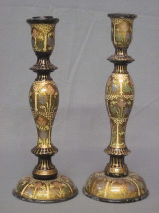 A pair of Moorish style candlesticks 12"