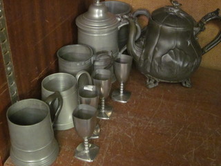 A James Dixon Britannia metal teapot, a pewter stein, 4 various  pewter tankards and 4 small pewter goblets