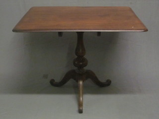 A 19th Century mahogany snap top breakfast table, raised on a pillar and tripod base 38"