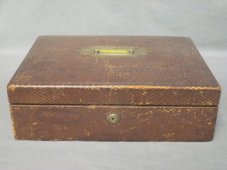 A Victorian leather covered trinket box with hinged lid 14"