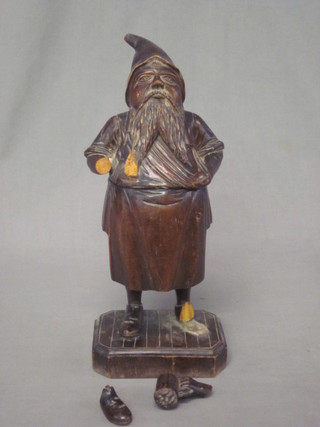 A carved Bavarian trinket box in the form of standing gnome, f, 15"