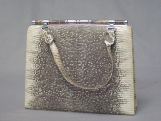 A snake skin handbag