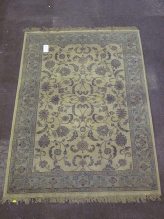 A machine made brown ground Persian style rug 70" x 46"