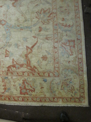 A bleached Persian carpet with floral design to the centre 134" x  106"