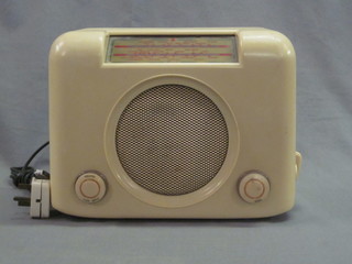 A Bush Type D.A.C 90a radio contained in a white Bakelite case