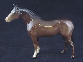 A Beswick figure of a standing bay foal 6"   ILLUSTRATED