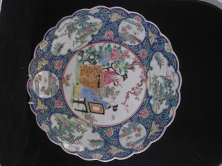A famille vert porcelain dish with lobed borders, decorated 2  figures sat at a table 14"