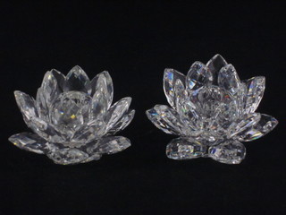 A pair of Swarovski glass candlesticks in the form of flower heads 2", 1 foot f,