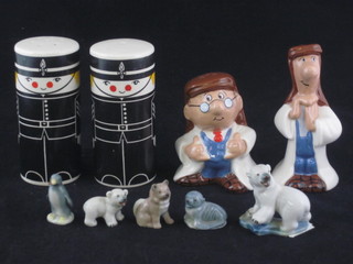 A Carltonware salt and pepper in the form of standing soldiers, a Wade salt and pepper in the form of Tetley Tea men and 5 Wade  Whimsies Polar Set figures