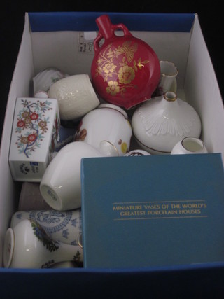 A collection of various miniature reproduction porcelain vases