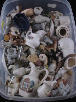 A collection of Wade Whimsies, miniature items of china etc