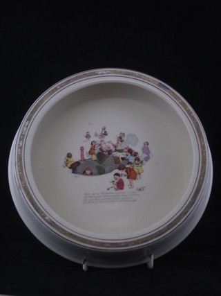 A childs Wade Heath pottery dish decorated The Old Woman  Who Lived in a Shoe, 8 1/2"