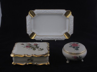 A rectangular Rosenthal porcelain jar and cover decorated roses  5", do. ashtray 8" and a West German porcelain jar and cover 3"