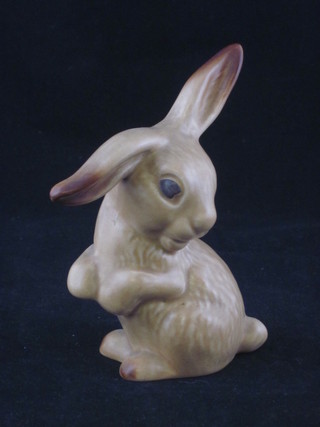 A Wade figure of a seated Rabbit, base impressed 1302 4"