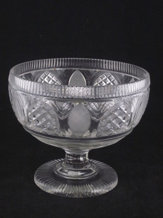 A cut glass pedestal bowl raised on a spreading foot 8"
