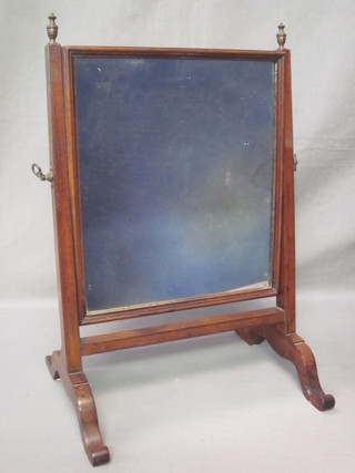 A 19th Century rectangular plate dressing table mirror contained  in a mahogany swing frame 13"
