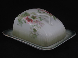 A green glazed floral patterned cheese dish and cover 6 1/2"