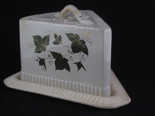 A 19th Century wedge shaped pottery cheese dish and cover with  ivy decoration 8"