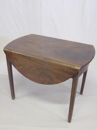 A 19th Century oval Pembroke table fitted a drawer and raised  on square supports 36"