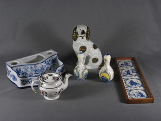 A Staffordshire style figure of a seated Spaniel 7", a blue and white "Meissen" porcelain pen tray 8", 2 Moorcroft style vases, a  miniature teapot and 4 miniature tiles