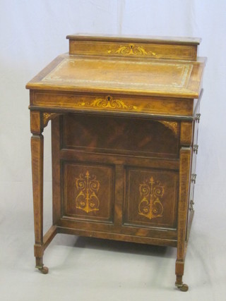 A Victorian inlaid rosewood Davenport, the stationery box with brass pierced three-quarter gallery, the pedestal fitted 4 long  drawers, raised on square tapering supports 22" 