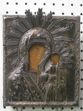 An Icon "Blessed Virgin and Christ in Glory", contained in an embossed silver mount marked 84W, with inscription to the  reverse 7" x 6"  ILLUSTRATED