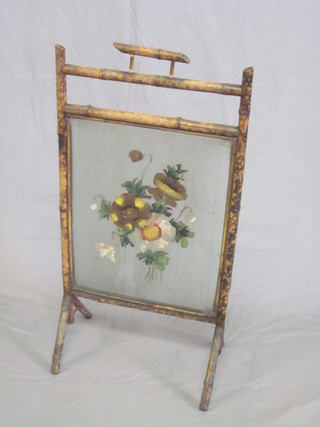 A 1920's bamboo and glass fire screen 18"