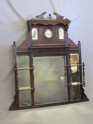 An Edwardian multiple plate over mantel mirror contained in a  walnut frame 38"