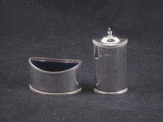 A silver boat shaped salt with matching pepper, Chester 1913