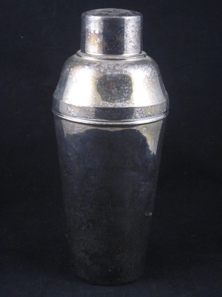A silver plated cocktail shaker