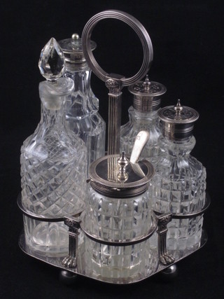 A silver plated and cut glass 5 bottle cruet