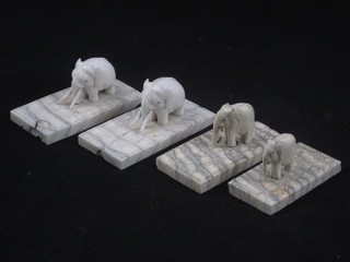 3 carved ivory figures, raised on marble bases 4"