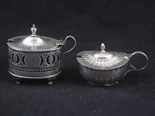 An oval pierced silver mustard pot with blue glass liner and 1 other, 3 ozs