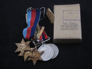 A group of 5 comprising 1939-45 Star, African Star and 1st  Army Bar, Italy Star, Defence & War medal, with original paper  box of transmission
