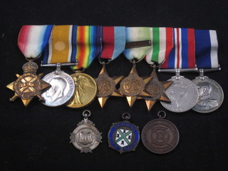 A group of 8 medals to J254660 F Reynolds Able Bodied Royal  Navy comprising 1914-15 Star, British War medal, Victory  medal, 1939-45 Star, Atlantic Star with France & German clasp,  Italy Star, British War medal, George V issue Royal Naval Long  Service Good Conduct medal HMS Britannic, together with a  silver watch chain medallion, a bronze Royal Life Saving medal  and 1 other  ILLUSTRATED