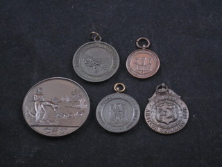5 bronze swimming medals