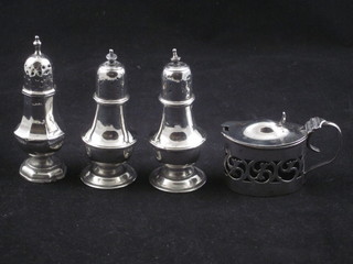 3 various silver pepperettes, a pierced silver mustard pot
