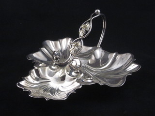 A silver plated scallop shaped 3 section dish