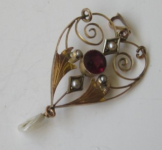 A 9ct gold pendant set red stones and pearls