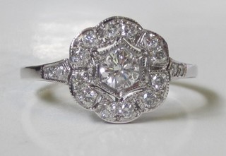 An 18ct white gold diamond cluster ring, approx 0.50ct