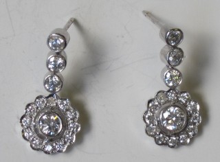 A pair of diamond cluster drop earrings, approx 1.60ct