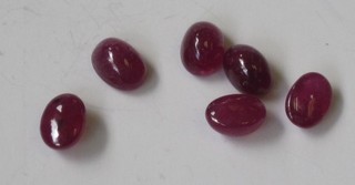 6 unmounted cabouchon rubies