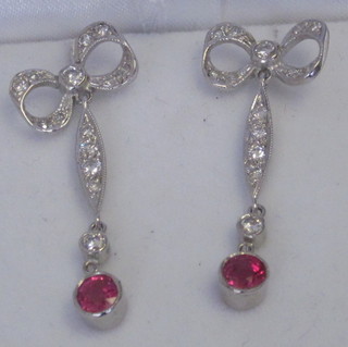 A pair of ruby and diamond bow drop earrings approx 0.50ct