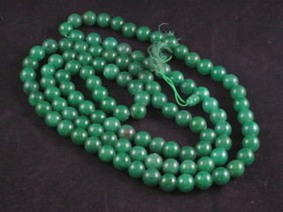 A string of green hardstone beads