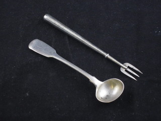 A Georgian silver fiddle pattern mustard spoon and a silver  pickle fork